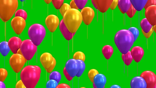 3d animation Colorful balloons flying in the air on a green background. Festive birthday effect. 4k three-dimensional video