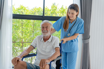 Fototapeta premium Elderly man talk to doctors and nurses in the hospital. senior male happy after receiving treatment and care and practice walk from a professional doctor. health care, physical therapy, nursing home
