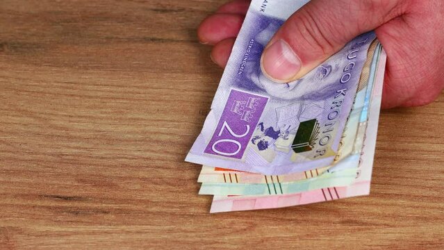 Counting Swedish kronor, Sweden money, various banknotes, Household budget concept