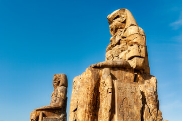 Fototapeta na wymiar Colossi of Memnon in Luxor, Egypt