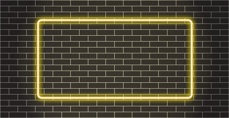 Black brick wall with yellow glowing neon frame graphic design.