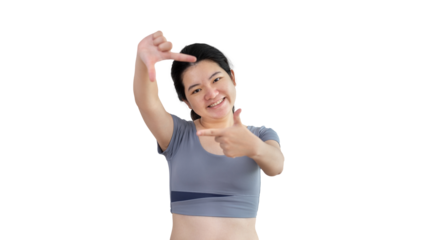 Playful young asian woman in good mood posing for photo or photo frame with fingers on PNG file,  Use your fingers to act like a photograph, Mark as if taking a photo.