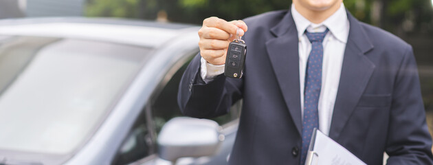 Business car rental, sell or buy service, dealership hand of agent dealer, sale man giving auto key...