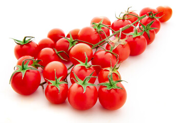 cluster of cherry tomatoes isolated on a white background