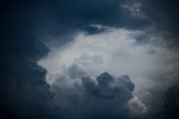 Natural background with dramatic and rainy grey clouds on sky