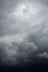 Natural background with dramatic and rainy grey clouds on sky