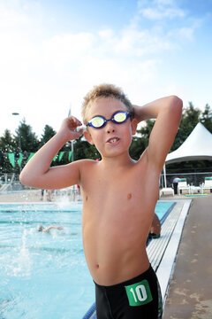 Boy getting ready for the swimming portion of a triathlon