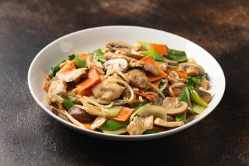 Chicken Chop Suey in white plate. Take away food