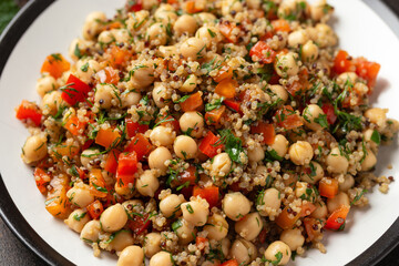 Chickpea Salad with Quinoa, sweet red pepper, herbs and lemon. Healthy food