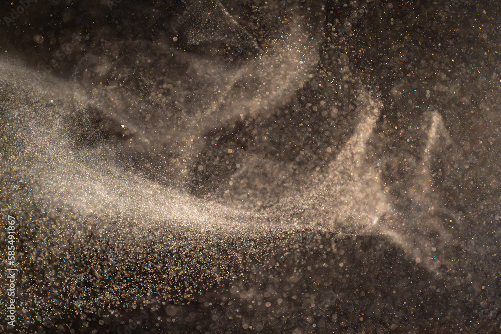 Canvas Prints organic dust particles floating on a light beam on black background. glittering sparkling flickering
