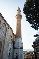 Minaret of Ulucami Mosque in Bursa, Turkey. The mosque is the largest mosque in Bursa.