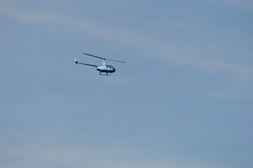 blue helicopter in flight