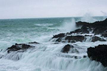 Fototapeta na wymiar Crashing Waves on rocks