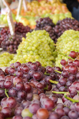 fresh red and white grapes at a flea market