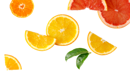 Fresh juicy grapefruit, orange and tangerine slices flying isolated on white background.