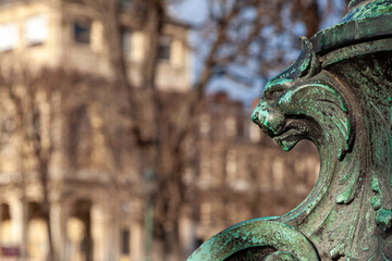 Bronze lion head, detail from a public fountain in the Luxembourg Gardens, in Paris, France, Europe.