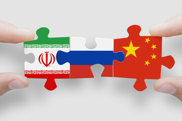 Puzzle made from flags of Iran, Russia, and China. Russia and China relations and military...