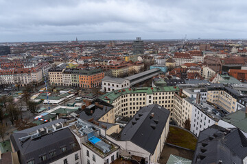 View from the bell tower of the church of st. Peter of the city of Munich on a cloudy and rainy day.