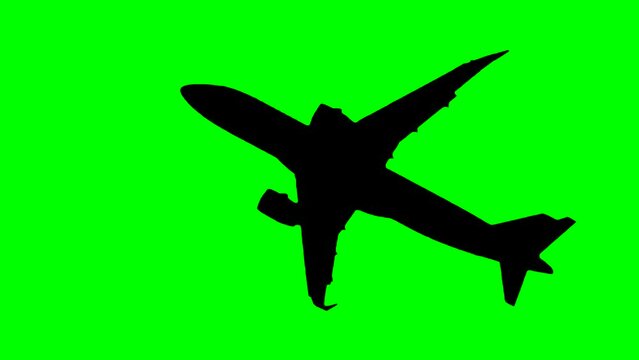 Black silhouette of passenger airplane, airliner is taking off, gaining altitude, flying against green background. Chroma key, slow motion, green screen and template concept