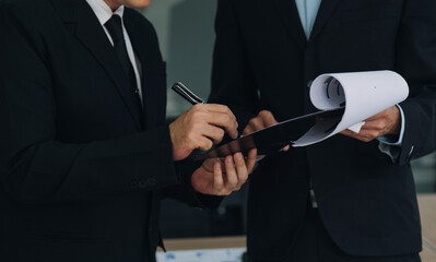 Entrepreneurs and business people conference in modern meeting room, happy multiracial coworkers have fun cooperating working together at office meeting, asian teamwork concept