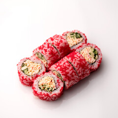 Obraz na płótnie Canvas Set of sushi rolls with flying fish caviar, crabs, avocado, cucumber. California rolls. Japanese food. Asian cuisine. Seafood dishes. White background. Top view. Copy space.