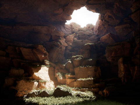The old cave in the mountais with a light from the top hole stones enviorment