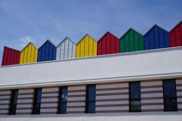 colorful beach houses on the roof of a building in Vendée, France