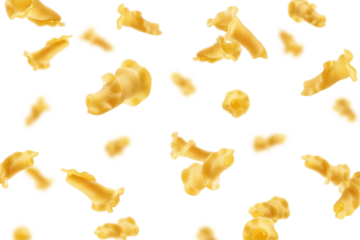 Falling raw Campanelle, uncooked Italian Pasta, isolated on white background, selective focus