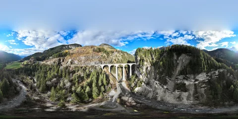 Foto op Plexiglas Landwasserviaduct Seamless spherical HDRI aerial panorama 360 degrees for VR virtual reality of Landwasser Viaduct world heritage sightseeing Glacier express train railway landscape in Swiss Alps, Switzerland autumn.