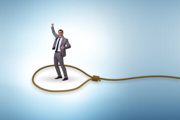 Business people trapped by a rope
