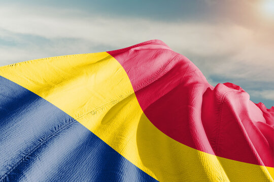  Chad national flag cloth fabric waving on beautiful grey background.