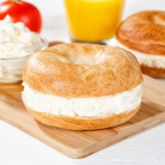 Bagel sandwich with cream cheese for breakfast square