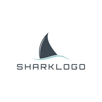 Shark fin over water simple logo symbol