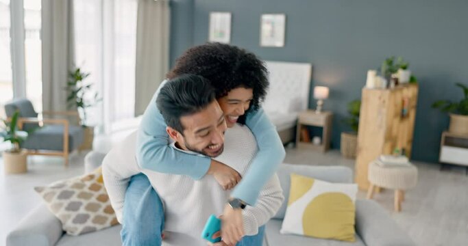 Love, couple and phone with a playful woman jumping on her man during a call, argument or disagreement. Energy, excited and freedom with a female hugging her boyfriend with handheld movement