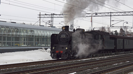 Arrival of old museum locomotive Ukko-Pekka in Finnish Kerava town.