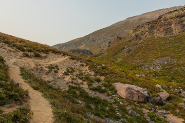 Fototapeta na wymiar steep terrain in the high tundra mountains at sunset