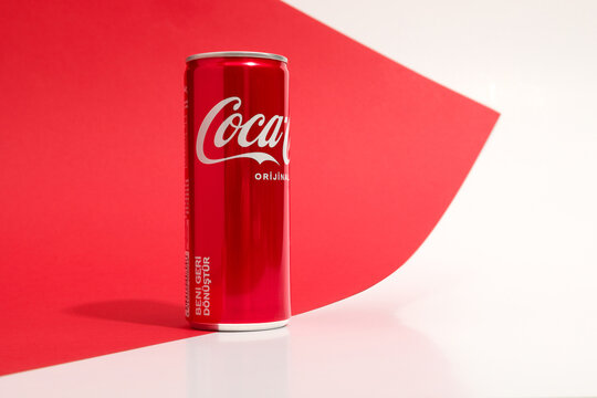 Coca-cola can on the white and red background. - Istanbul, Turkey, 26 march 2023