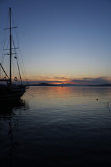 Fototapeta na wymiar Boat and Sunset