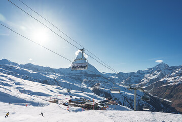 Beautiful view of Gornergrat, Zermatt, Matterhorn ski resort in Switzerland with cable chair lift...