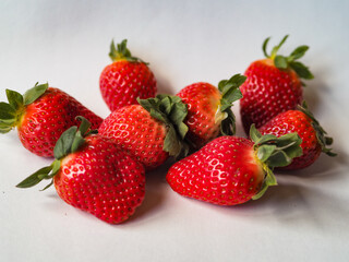 Strawberry on white background. Fresh sweet fruit closeup