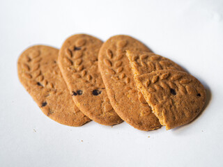 Cereal cookies with chocolate pieces on a white background. Healthy cookies