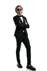 Fototapeta premium businessman posing with chin up and crossed arms