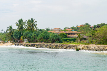 Beautiful tropical coast with a sandy beach. Photography for tourism background, design and advertising