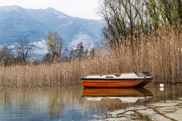 Rowing boat on the lakeside of Lake Pusiano