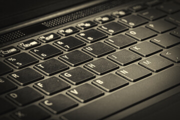 a fragment of a computer keyboard photographed in close-up