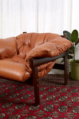 Brown leather Brazian rosewood vintage chair. 1960s Mid-century Modern living room furniture....