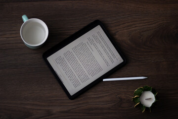 Reading e-books online on a tablet at home