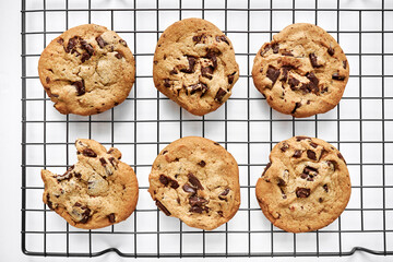 chocolate chip cookies on a rack 
