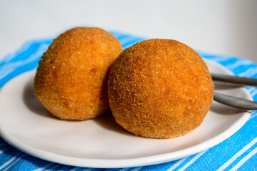 Traditional street food in UK, stuffed fried Scotch eggs with breadcrumbs