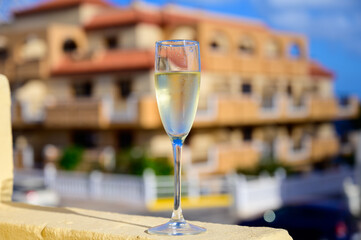 Dinner party, drinking of cava or champagne sparkling wine in vacation resort Caleta Fuste, Fuerteventura, Canary islands vacation, Spain